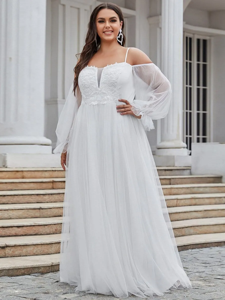 Robe de mariée maxi à épaules dénudées et manches bouffantes transparentes